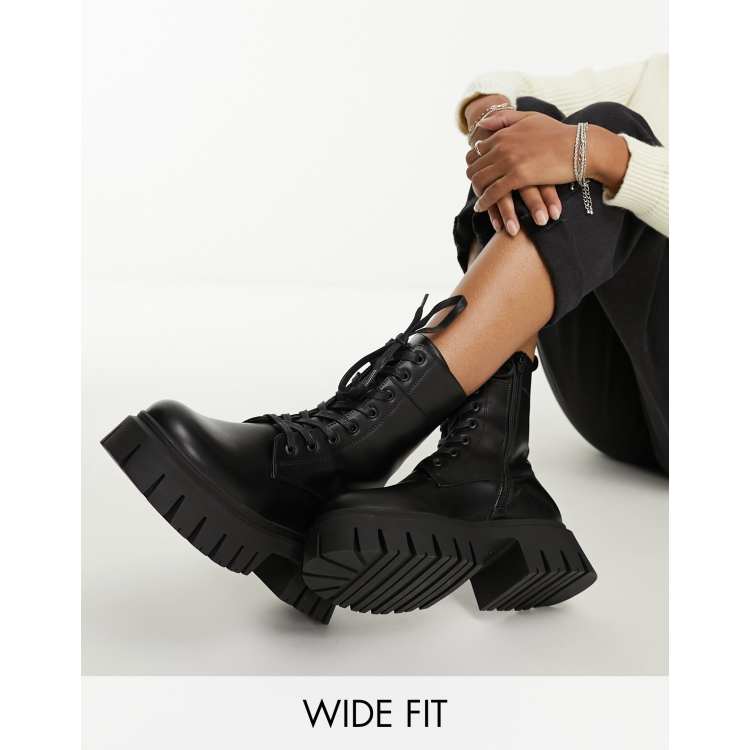 ASOS DESIGN lace up boot with chunky sole and studded strapping in