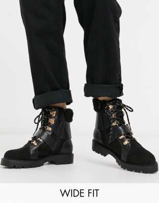 black lace up boots with fur