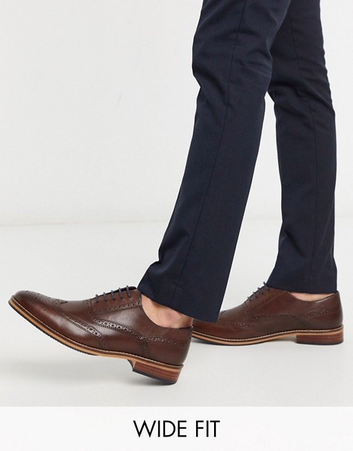 ASOS DESIGN Wide Fit brogue shoes in brown leather with natural sole and colour details