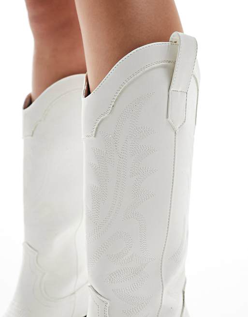 ASOS DESIGN Wide Fit Camden flat western knee boots in white ASOS