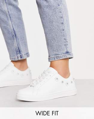 ASOS DESIGN Wide Fit Dawn lace up trainers with flower trims in white ...