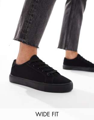 Shop Asos Design Wide Fit Dizzy Lace Up Sneakers In Black Drench