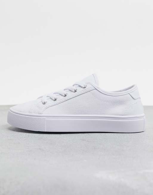 ASOS DESIGN Wide Fit Dizzy lace up sneakers in white