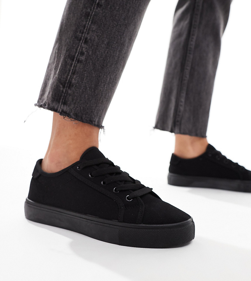 ASOS DESIGN Wide Fit Dizzy lace up trainers in black drench