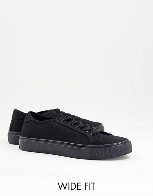ASOS DESIGN Wide Fit Dizzy lace up trainers in black drench