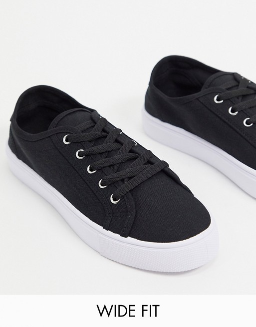 ASOS DESIGN Wide Fit Dizzy lace up trainers in black