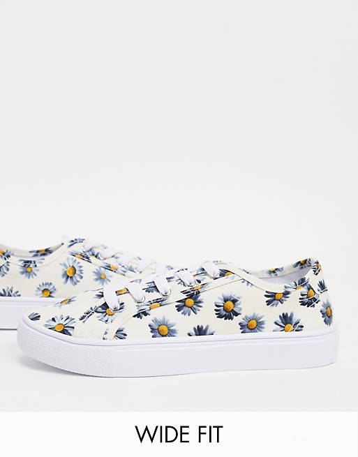 ASOS DESIGN Wide Fit Dizzy lace up trainers in daisy print