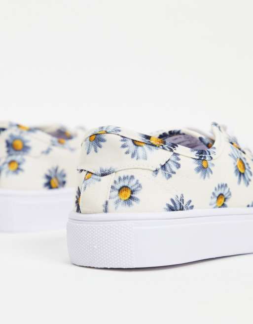 ASOS DESIGN Wide Fit Dizzy lace up trainers in daisy print ASOS