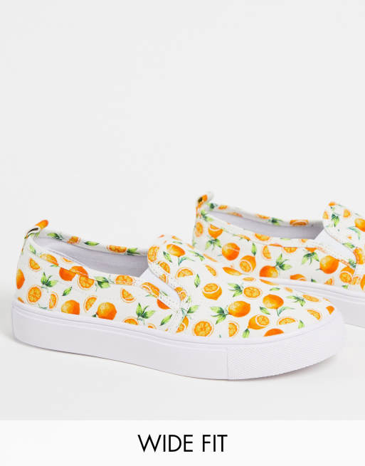 ASOS DESIGN Wide Fit Dotty slip-on canvas sneakers in fruit print