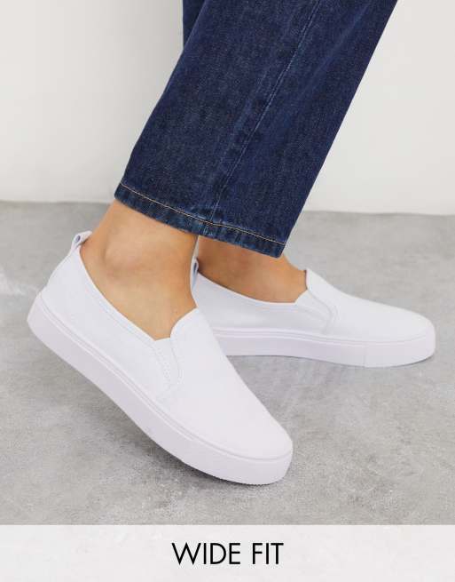 ASOS DESIGN Wide Fit Dotty slip on plimsolls in white | ASOS