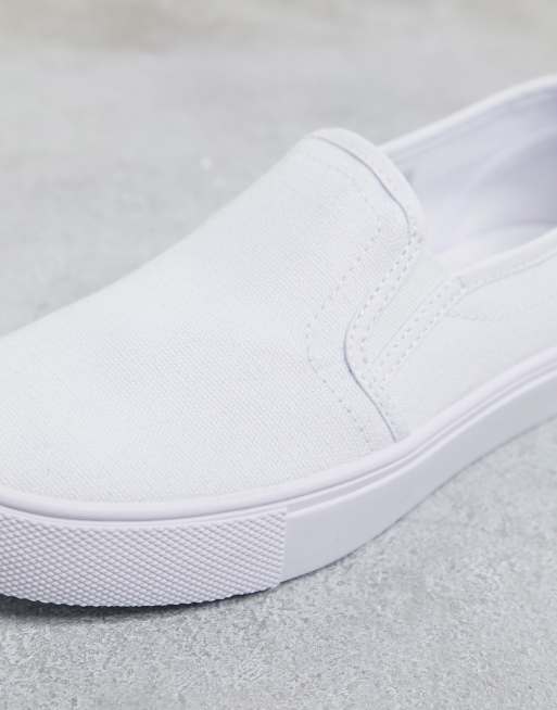 ASOS DESIGN Wide Fit Dotty slip on plimsolls in white