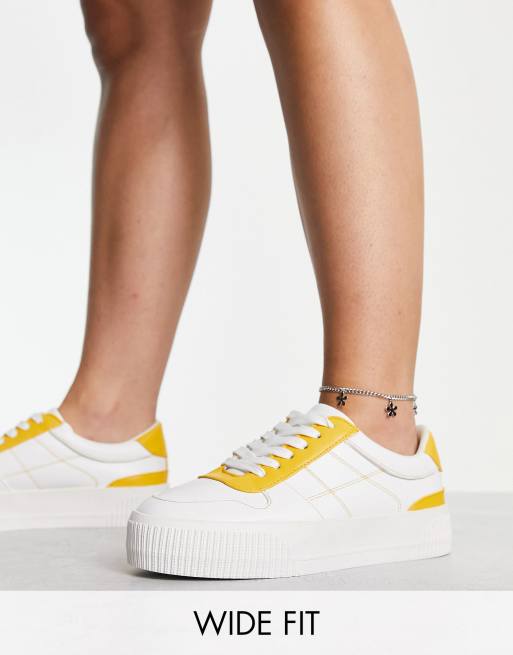 ASOS DESIGN Wide Fit – Duet – Biało-żółte sznurowane buty sportowe na płaskiej platformie