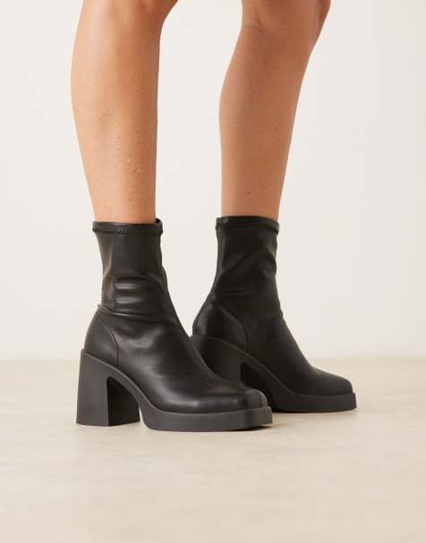 ASOS DESIGN Wide Fit Edison square toe chunky heeled sock boots in black - view 1