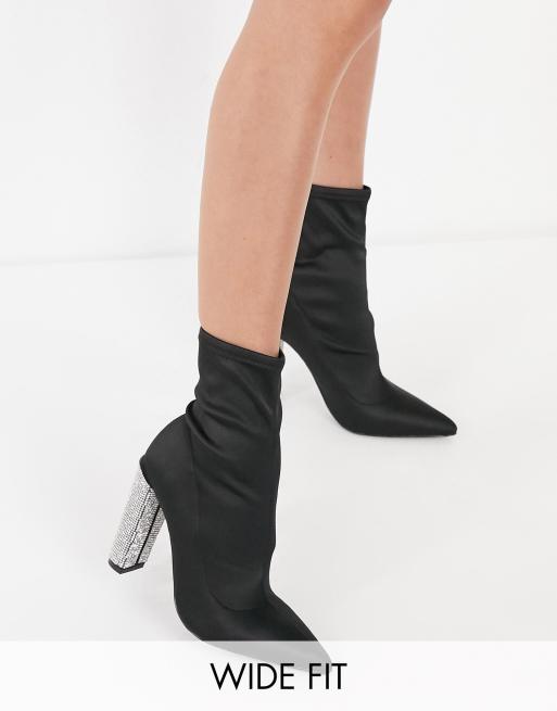 asos design elsie high heeled sock boots in black patent