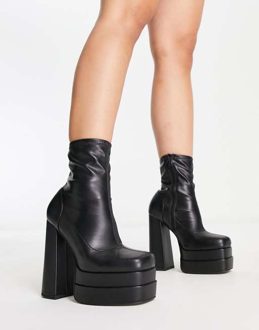 ASOS DESIGN Wide Fit Evelyn high-heeled platform boots in black | ASOS