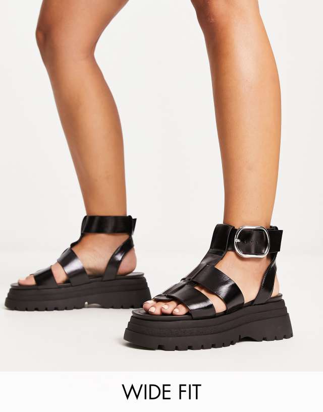 ASOS DESIGN Wide Fit Factor buckle hardware fisherman flat sandals in black - BLACK