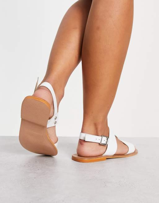 ASOS DESIGN Wide Fit Fiery cross strap flat sandals with diamante in pink