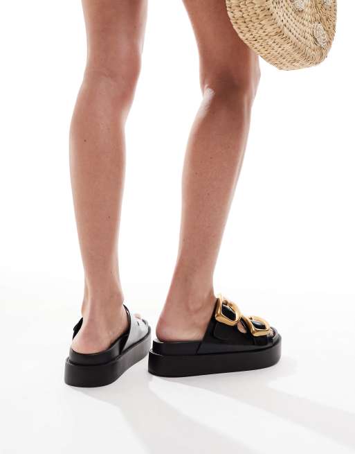 ASOS DESIGN Wide Fit Femi oversized buckle footbed mules in black