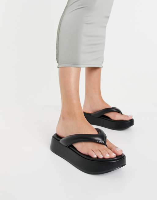 ASOS DESIGN flip flops with angular wedge sole in black - ShopStyle