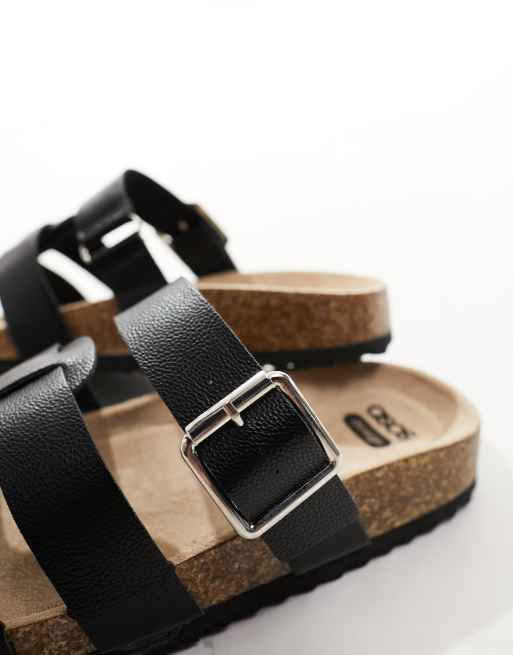 ASOS DESIGN Wide Fit Field mule flat sandals in black | ASOS