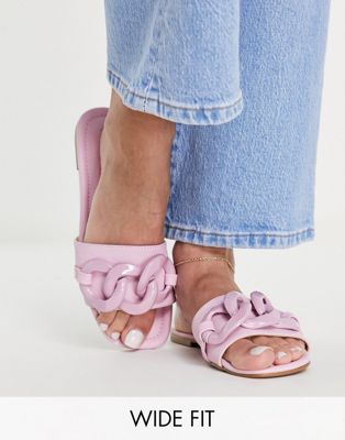 ASOS DESIGN Wide Fit Fife flat mules with chain in pink