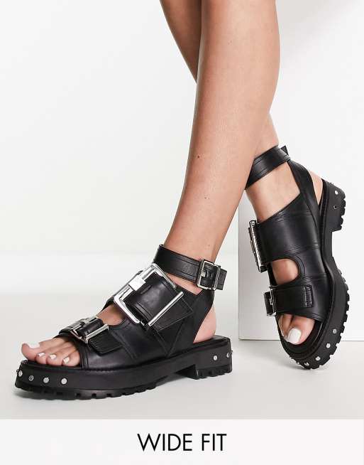 ASOS DESIGN Wide Fit Finchley Hochwertige flache Ledersandalen in Schwarz mit dicker Sohle und Schnallen weite Passform ASOS