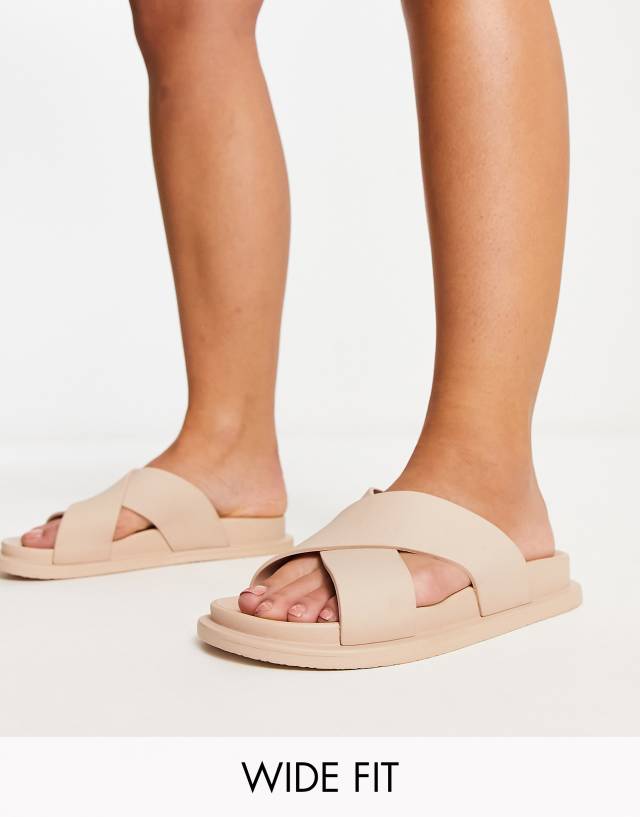 ASOS DESIGN Wide Fit Fixation cross-strap jelly flat sandals in beige - BEIGE