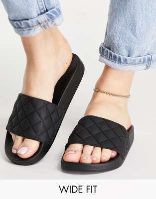 ASOS DESIGN Wide Fit Flare quilted sliders in black ASOS