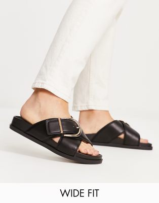 ASOS DESIGN Wide Fit - Flash - Flache Sandalen in Schwarz mit überkreuzten Riemen und Schnallen