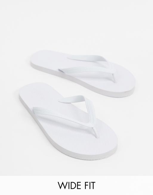 ASOS DESIGN Wide Fit flip flops in white
