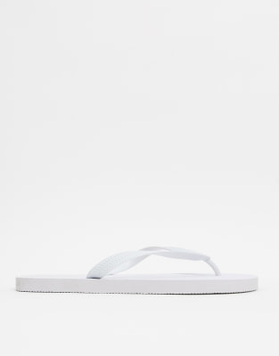 white cloth flip flops