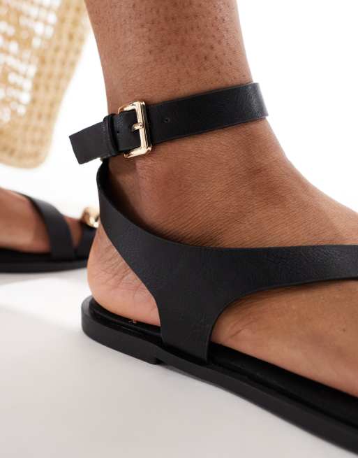ASOS DESIGN Wide Fit Florrie toe loop strappy sandal in black