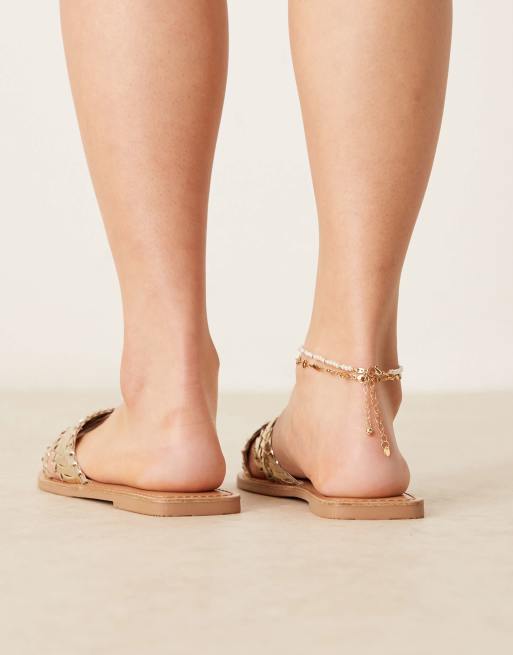 ASOS DESIGN Wide Fit Flossie woven flat sandals in gold