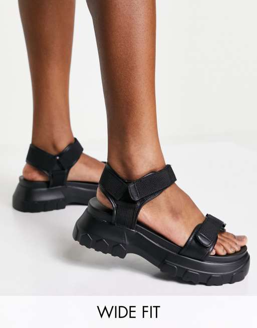 ASOS DESIGN Wide Fit Fly By chunky sporty sandals in black ASOS