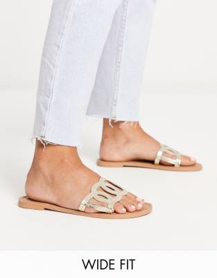 ASOS DESIGN Wide Fit - Frappe - Sandali bassi color oro a pianta larga