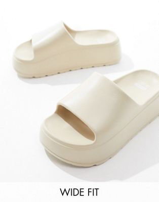 Asos Design Wide Fit Freedom Cleated Chunky Sliders In Off-white