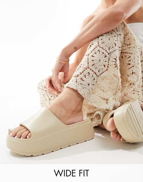 ASOS DESIGN Wide Fit Freedom cleated flatform slides in off-white - view 1