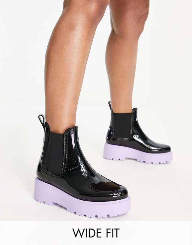 ASOS DESIGN Wide Fit Gadget chunky chelsea wellies in black with lilac sole