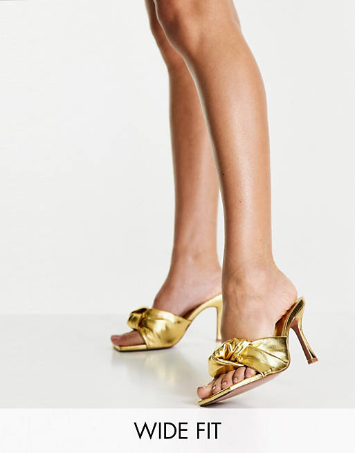 ASOS DESIGN Wide Fit Harlie knotted mid heeled mules in gold