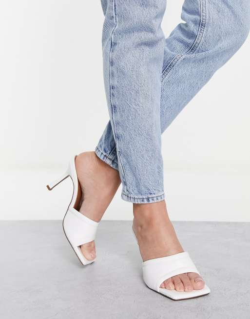 Mid block heel outlet mules