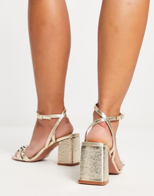 ASOS DESIGN Wide Fit Heath studded mid heeled sandals in gold