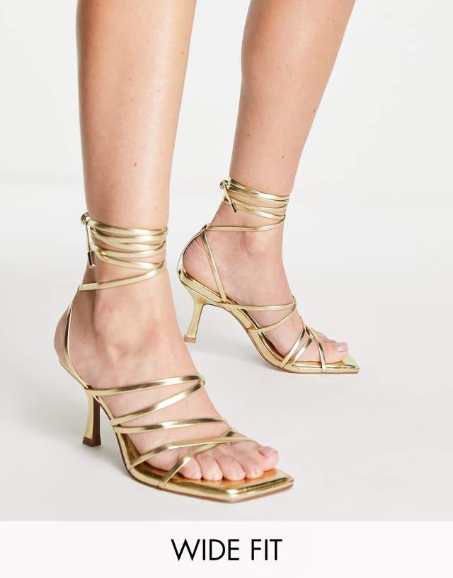 ASOS DESIGN Wide Fit Hiccup strappy tie leg mid heeled sandals in gold