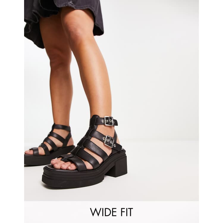 ASOS DESIGN Wide Fit Highway chunky mid heeled sandals in black