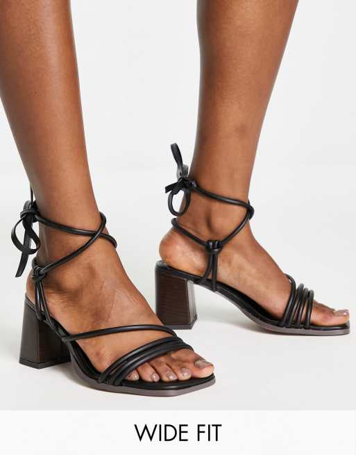 ASOS DESIGN Wide Fit Hollow strappy tie leg mid heeled sandals in black