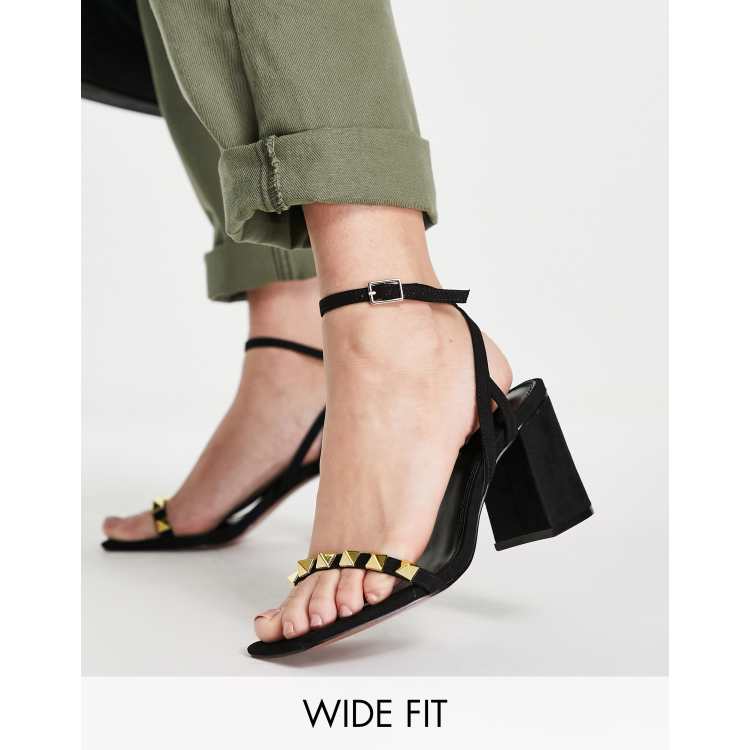 ASOS DESIGN Wide Fit Holt studded mid heeled sandals in black ASOS