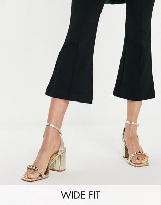 ASOS DESIGN Wide Fit Holt studded mid heeled sandals in gold | ASOS