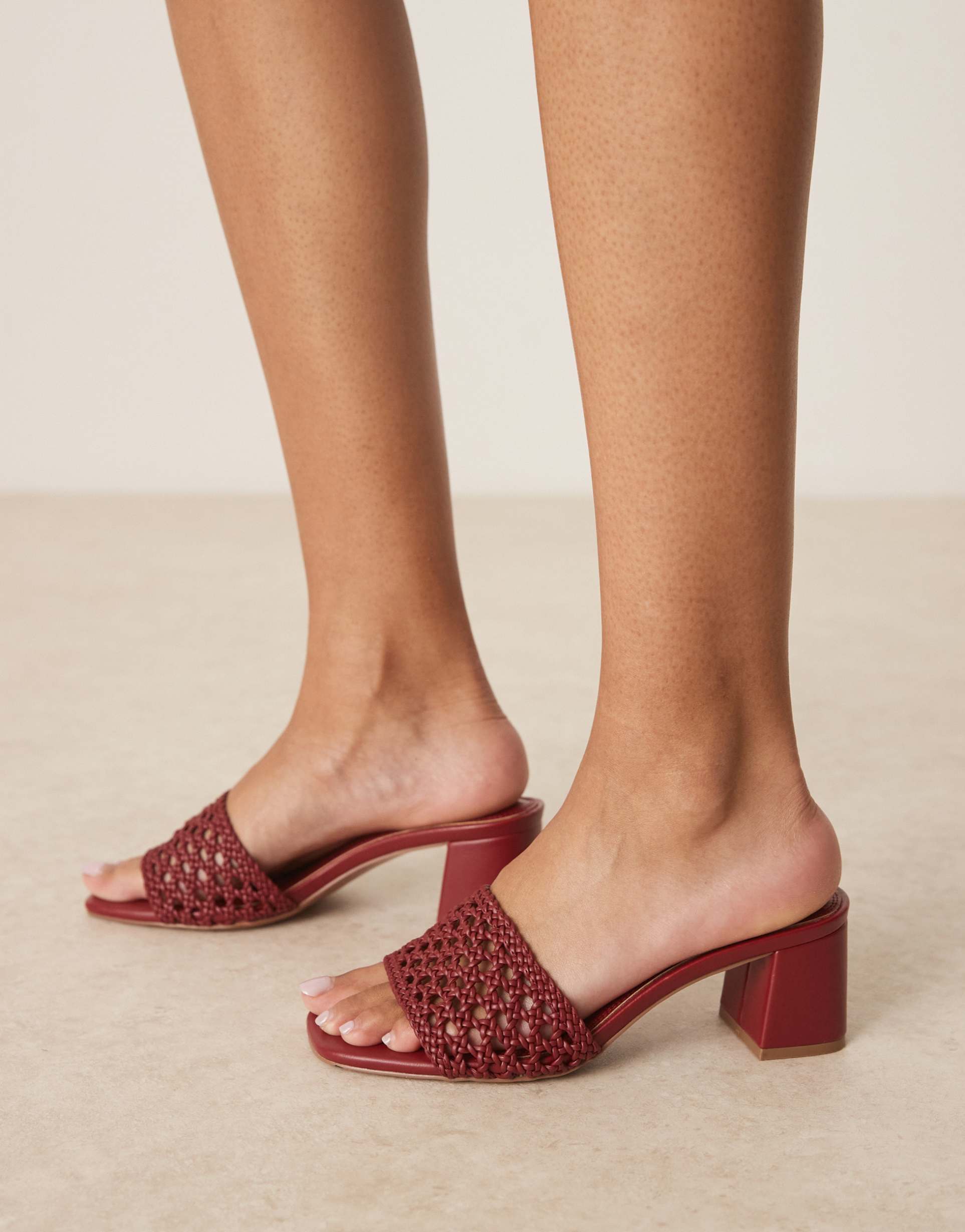 asos design wide fit honeycomb woven detail mid heeled mules in dark cherry