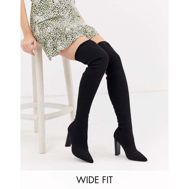 Black thigh high shop boots block heel