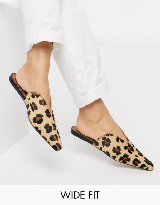 ASOS DESIGN Wide Fit Landing leather mules in leopard | ASOS