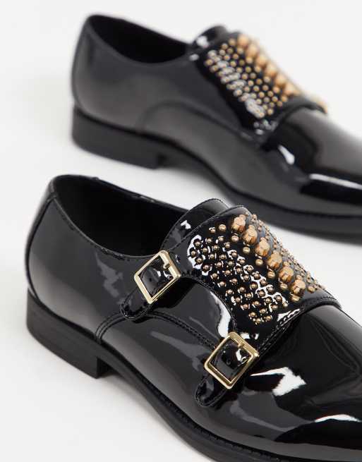 ASOS DESIGN Wide Fit monk shoes in black patent faux leather with gold studs  | ASOS